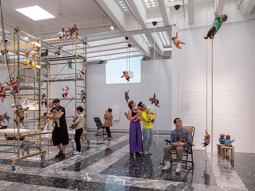208 baby dolls animate japan pavilion in ei arakawa-nash's playful ode to care - 3