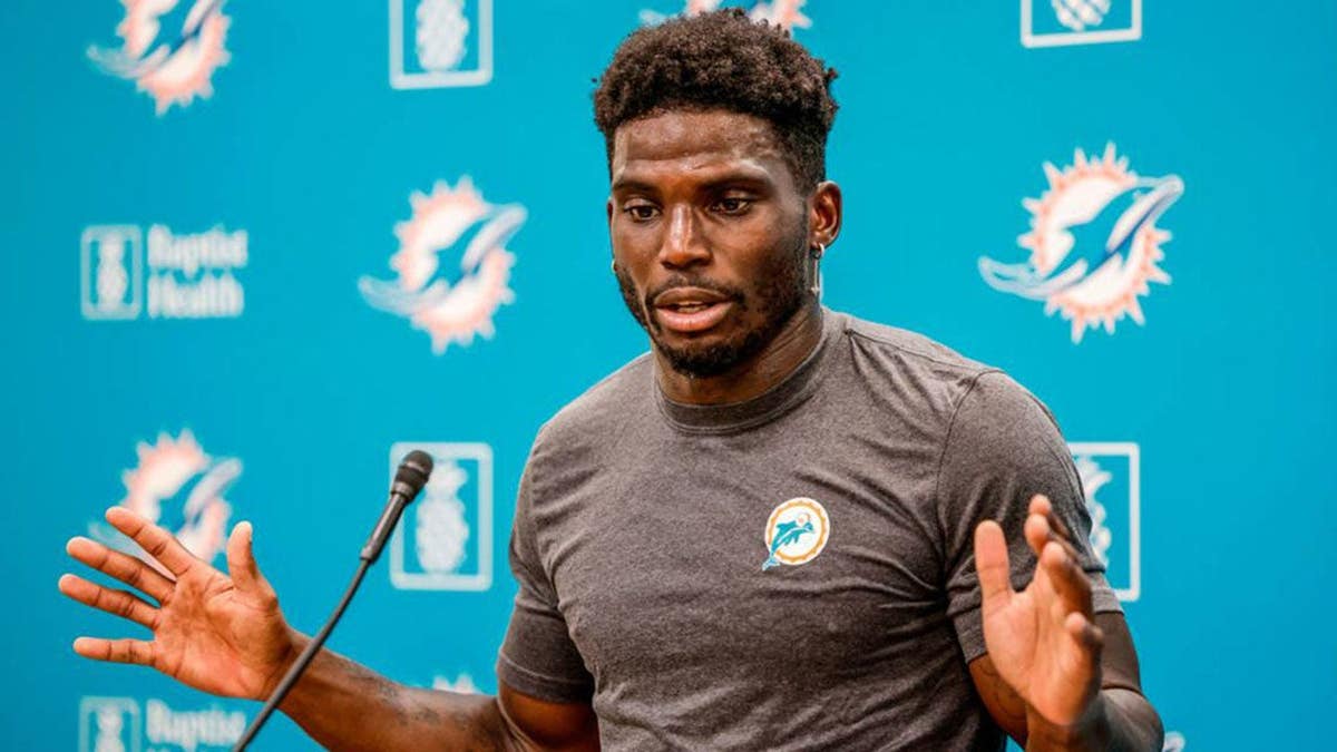 Tyreek Hill speaking to reporters at Baptist Health Training Complex in Miami Gardens Florida