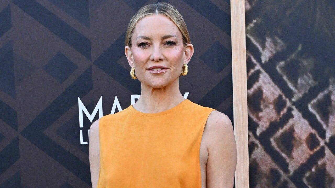 Kate Hudson risks wardrobe malfunction in bold cutout yellow gown