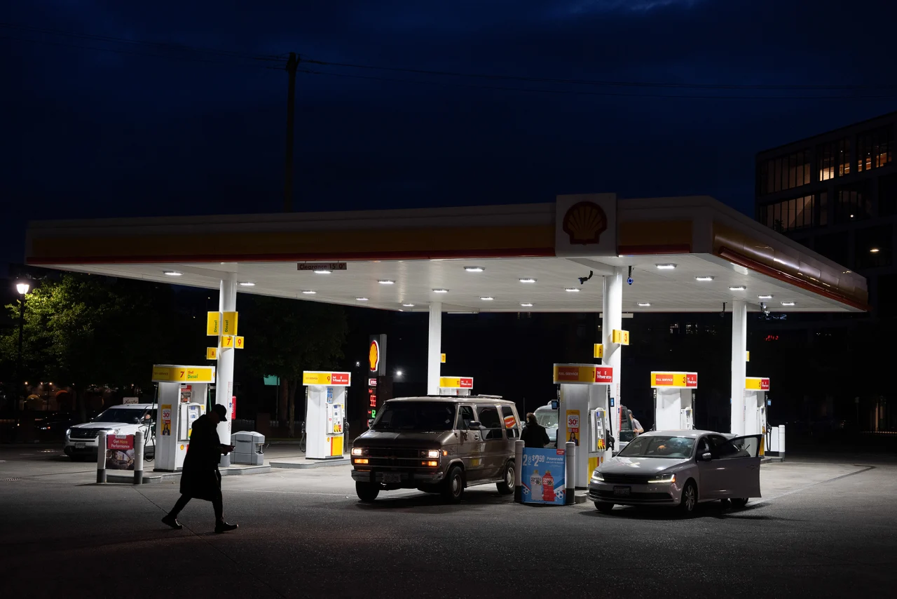 A person walks past a gas station in Portland, Oregon on May 6.