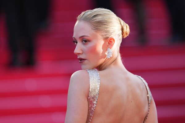 Maika Monroe poses for photographers at the opening ceremony and premiere of the film 'The Electric Kiss' during 79th international film festival, Cannes, southern France, Tuesday, May 12, 2026. (Photo by Scott A Garfitt/Invision/AP)