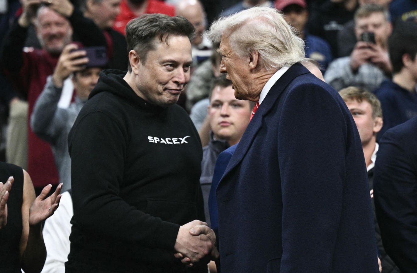 Huang, Musk, Cook Among Billionaire Delegation At Trump’s Xi Meeting