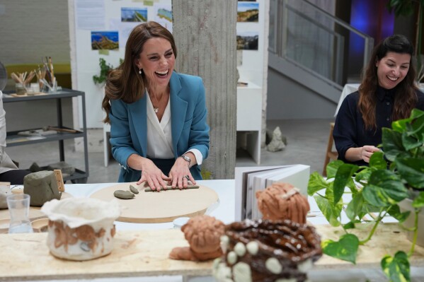 Britain's Kate, Princess of Wales, takes part in an immersive clay atelier workshop at the Loris Malaguzzi International Centre, part of a two-day trip, in Reggio Emilia, Italy, Wednesday, May 13, 2026. (AP Photo/Antonio Calanni, Pool)