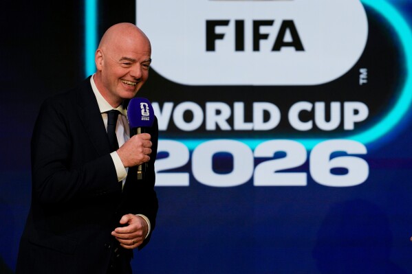 FIFA President Gianni Infantino speaks during the match schedule reveal for the 2026 soccer World Cup in Washington, Saturday, Dec. 6, 2025. (AP Photo/Chris Carlson, File)