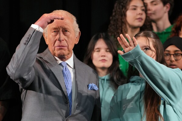 Britain's King Charles III joins students taking part in workshops organised by National Youth Music Theatre (NYMT) at The Other Palace in London, Thursday, May 14, 2026.(AP Photo/Kin Cheung, Pool)