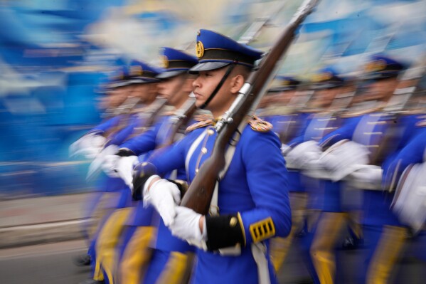 Military school students march during the 215th Independence Day parade in Asuncion, Paraguay, Thursday, May 14, 2026. (AP Photo/Jorge Saenz)
