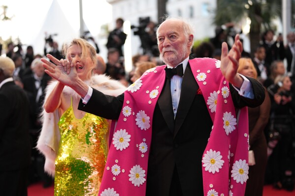 Sophie Desserteaux, left, and Jérôme Seydoux pose for photographers upon arrival at the premiere of the film 'Parallel Tales' at the 79th international film festival, Cannes, southern France, Thursday, May 14, 2026. (Photo by Scott A Garfitt/Invision/AP)