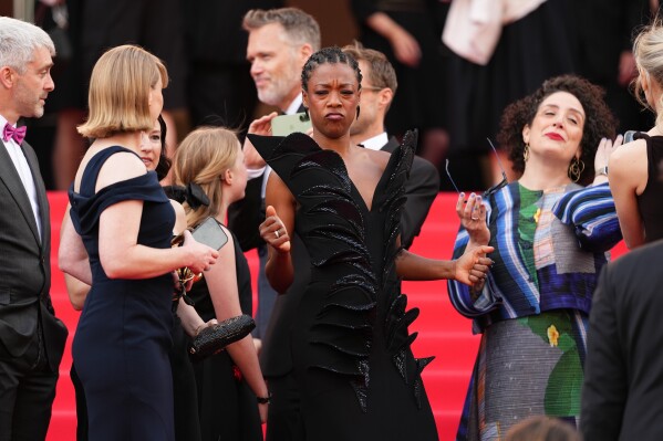Samira Wiley, centre, poses for photographers upon arrival at the premiere of the film 'Fatherland' at the 79th international film festival, Cannes, southern France, Thursday, May 14, 2026. (Photo by Scott A Garfitt/Invision/AP)