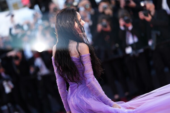 Jury member Demi Moore poses for photographers upon arrival at the premiere of the film 'A Woman's Life' at the 79th international film festival, Cannes, southern France, Wednesday, May 13, 2026. (Photo by Scott A Garfitt/Invision/AP)