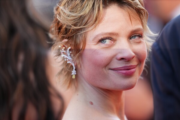 Mélanie Thierry poses for photographers upon arrival at the premiere of the film 'A Woman's Life' at the 79th international film festival, Cannes, southern France, Wednesday, May 13, 2026. (Photo by Scott A Garfitt/Invision/AP)
