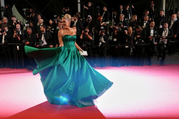 Hofit Golan poses for photographers upon arrival for the 25th anniversary of the film 'The Fast and the Furious' at the 79th international film festival, Cannes, southern France, Wednesday, May 13, 2026. (AP Photo/Andreea Alexandru)