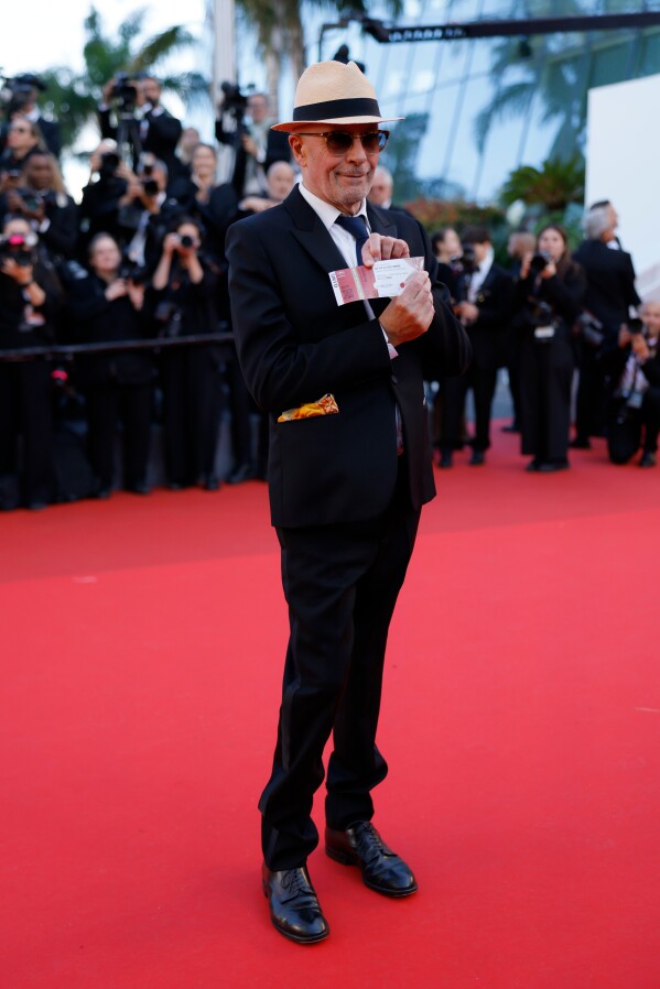 Jacques Audiard poses for photographers upon arrival at the premiere of the film 'A Woman's Life' at the 79th international film festival, Cannes, southern France, Wednesday, May 13, 2026. (Photo by Millie Turner/Invision/AP)