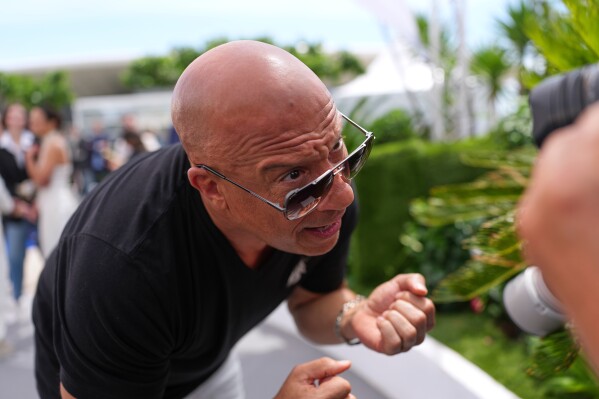 Vin Diesel poses for photographers at the photo call for the 25th anniversary of the film 'The Fast and the Furious' during the 79th international film festival, Cannes, southern France, Wednesday, May 13, 2026. (AP Photo/Andreea Alexandru)