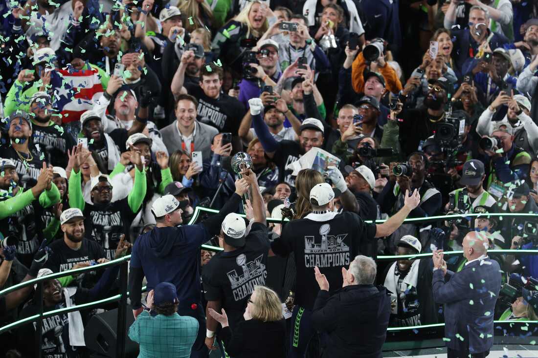 The Seattle Seahawks celebrate with the Vince Lombardi Trophy after winning Super Bowl LX against the New England Patriots at Levi's Stadium on February 8, 2026 in Santa Clara, Calif.