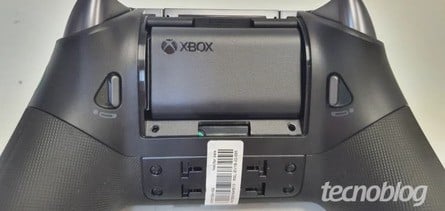 The left photo shows the scroll wheels, which could be used to adjust volume and game/chat mix, while the right photo reveals the rear of the device, including a removable rechargeable battery, lockable triggers and removable rear paddles. Click to enlarge. 