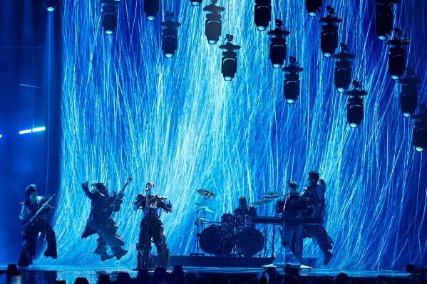 Lavina from Serbia performs the song "Kraj Mene" during the Grand Final of the 70th Eurovision Song Contest in Vienna, Austria, Saturday, May 16, 2026. (AP Photo/Martin Meissner)