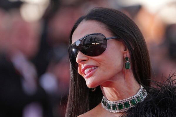 Jury member Demi Moore poses for photographers upon arrival at the premiere of the film 'Fjord' at the 79th international film festival, Cannes, southern France, Monday, May 18, 2026. (AP Photo/Andreea Alexandru)