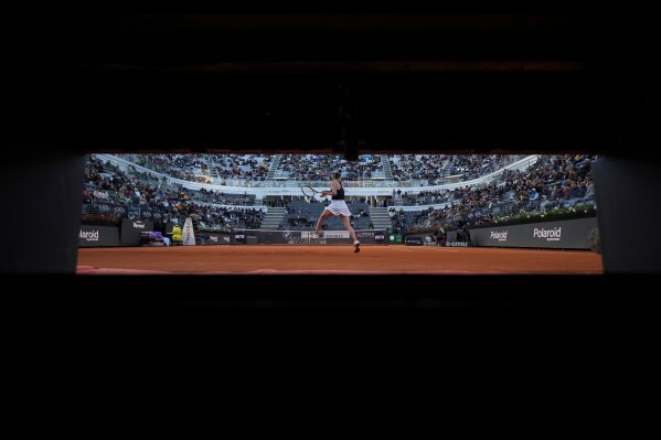 Ukraine's Elina Svitolina returns a ball to United States' Coco Gauff during their women's final match at the Italian Open tennis tournament in Rome, Saturday, May 16, 2026. (AP Photo/Andrew Medichini)