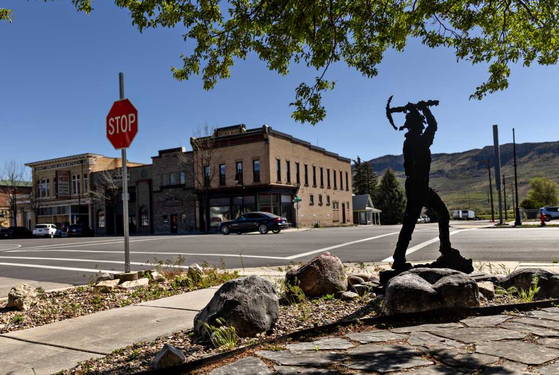A statue outside Coalville City Hall commemorates the town's history of coal mining.