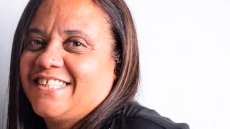 Celeste Reed of Jamaica, Queens, said she is working at...