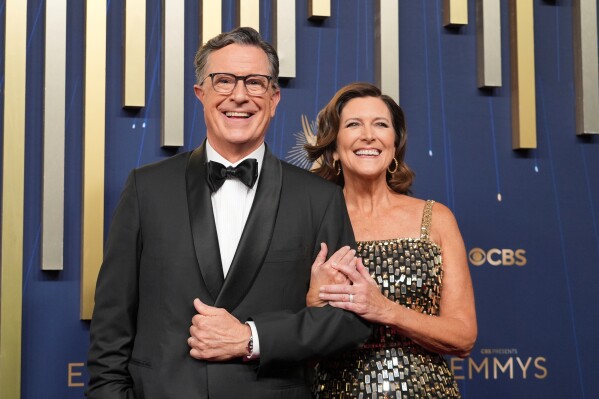 Stephen Colbert, left, and Evelyn McGee-Colbert appear at the 77th Primetime Emmy Awards in Los Angeles on Sept. 14, 2025. (AP Photo/Jae C. Hong, File)
