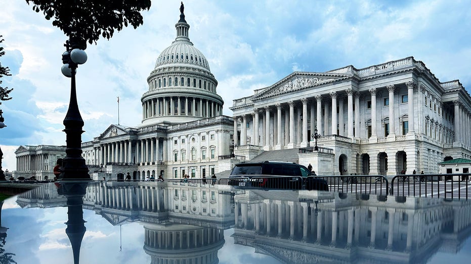 The U.S. Capitol's reflection after a rain storm.