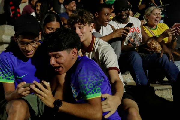 Fans celebrate Neymar's inclusion in Brazil's squad for the 2026 FIFA World Cup in Rio de Janeiro, Monday, May 18, 2026. (AP Photo/Bruna Prado)