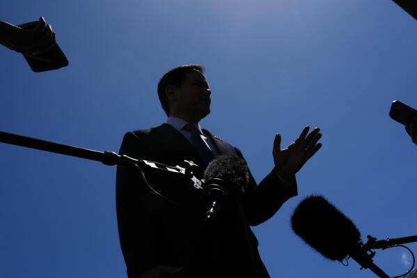 Secretary of State Marco Rubio speaks to the press before boarding his plane at Homestead Air Reserve Base, Thursday, May 21, 2026. Rubio is traveling to a NATO foreign ministers meeting in Sweden. (AP Photo/Julia Demaree Nikhinson, Pool)