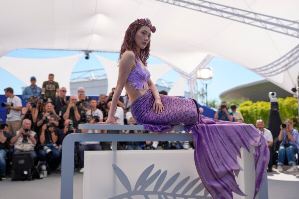 Arisa Sasaki poses for photographers at the photo call for the film 'Titanic Ocean' during the 79th international film festival, Cannes, southern France, Thursday, May 21, 2026. (AP Photo/John Locher)