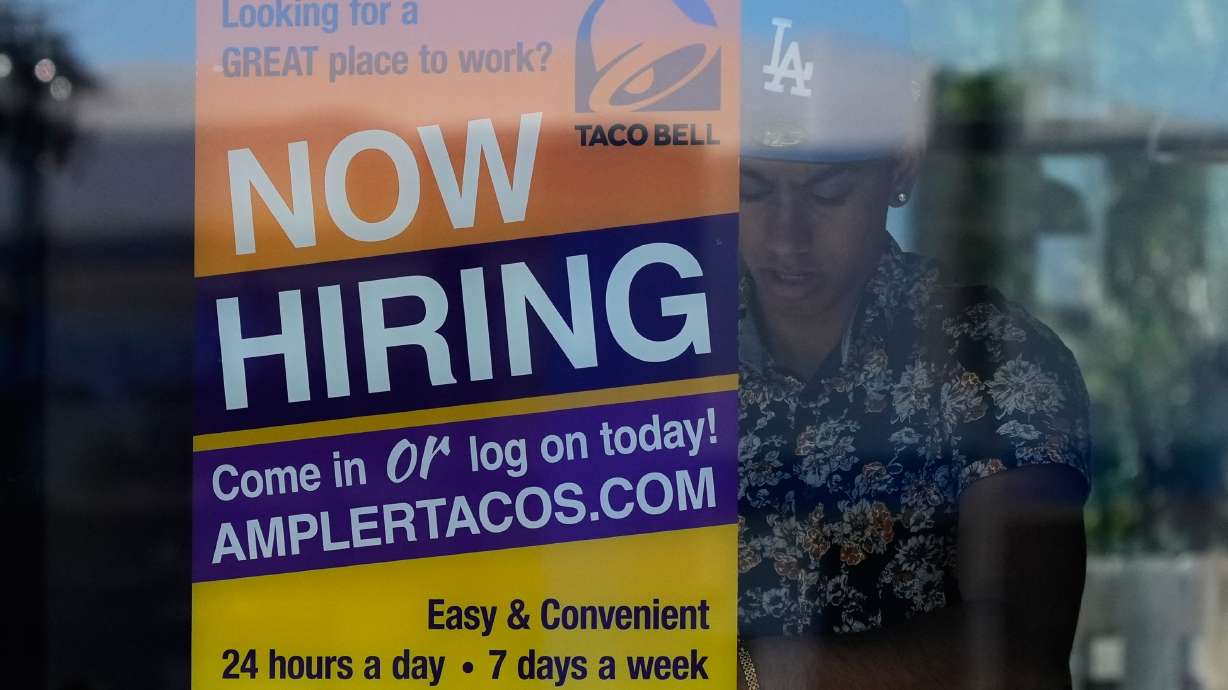 Jobless aid filings fell to 209,000 last week as layoffs remain low despite economic uncertainty