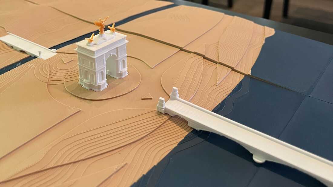 An architect's rendering of the proposed arch, with the Memorial Bridge and Lincoln Memorial at right, is on display for the Fine Arts Commission hearing