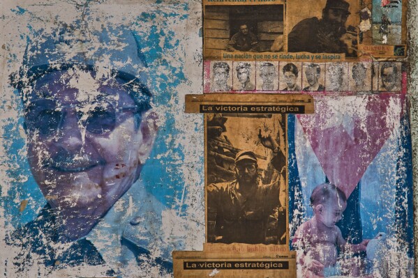 Images of Raul and Fidel Castro adorn the wall of a building that houses an art installation on the Cuban Revolution, in Havana, Cuba, Wednesday, May 20, 2026. (AP Photo/Ramon Espinosa)