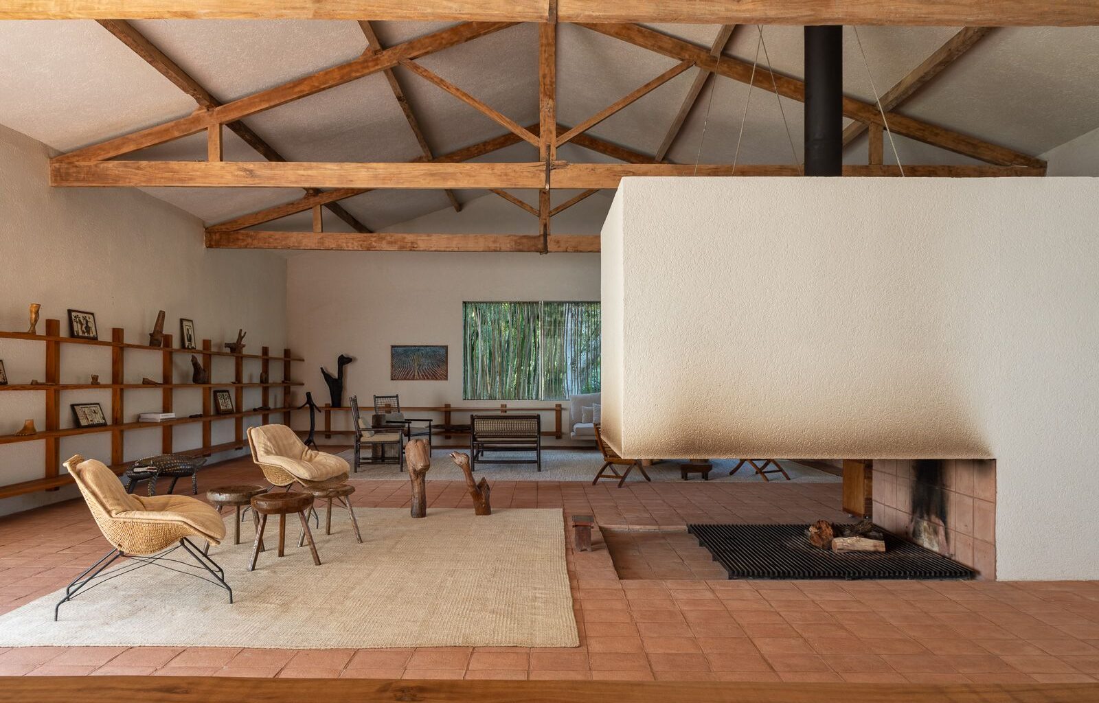 A Monumental Hearth Anchors This Agricultural Building Turned Home in Brazil