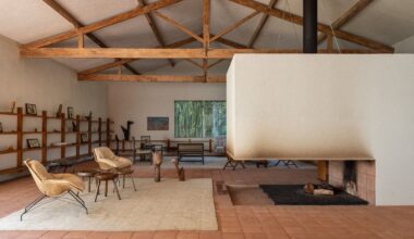 A Monumental Hearth Anchors This Agricultural Building Turned Home in Brazil