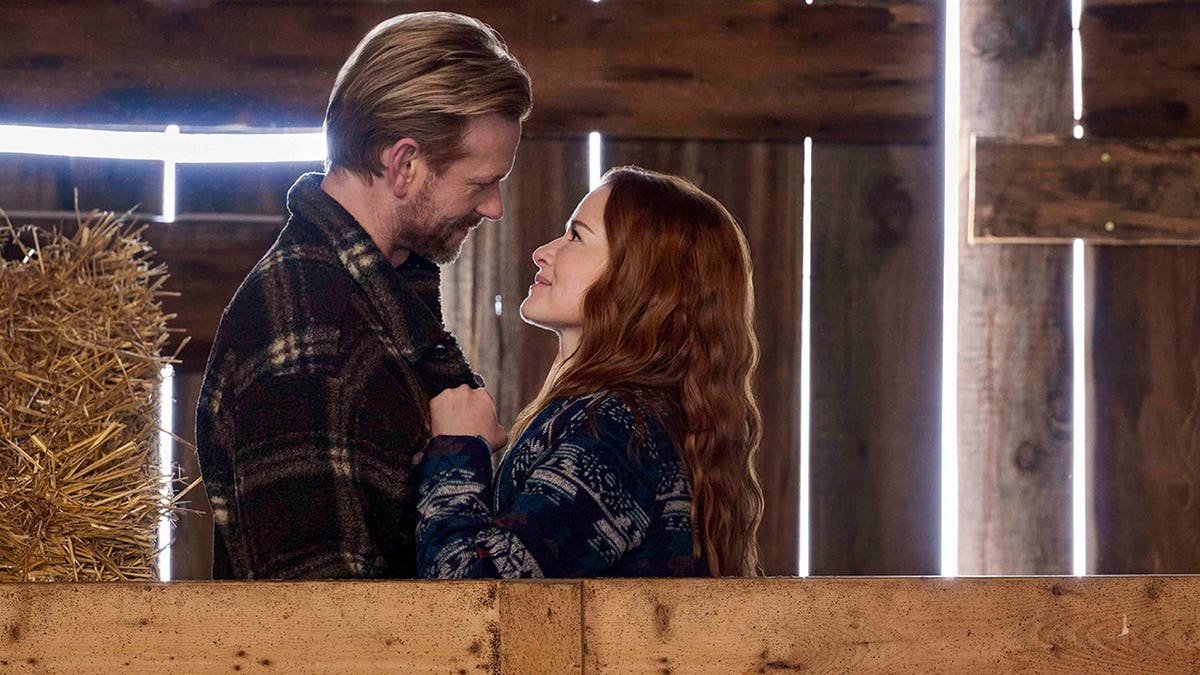 Eric Johnson and Sarah Drew filming a romantic scene for "When I Said I Do."