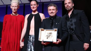 CANNES, FRANCE - MAY 23: L-R) Tilda Swinton, Renate Reinsve, Cristian Mungiu - winner of Palme D'or for "Fjord and Sebastian Stan on stage during the closing ceremony of the 79th annual Cannes Film Festival at Palais des Festivals on May 23, 2026 in Cannes, France. (Photo by Stephane Cardinale - Corbis/Corbis via Getty Images)