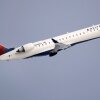 Short regional flights are the lifeblood of U.S aviation — but they were in decline even before jet fuel concerns struck. Here, a file photo shows a Delta Air Lines Connection regional jet operated by GoJet Airlines taking off from Logan International Airport in Boston.