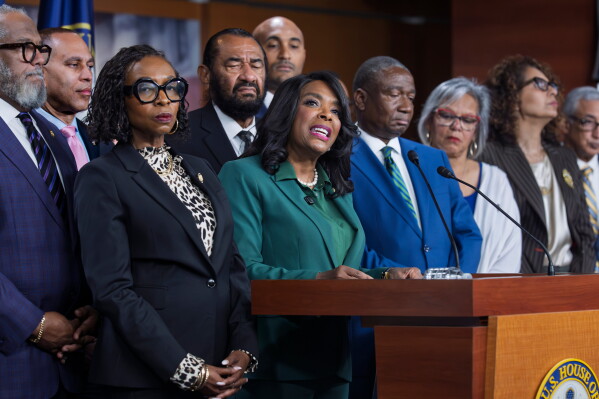 FILE—Rep. Terri Sewell, D-Ala., center, is surrounded by members of the Congressional Black Caucus as they speak to reporters in the wake of the Supreme Court ruling to strike down a majority Black congressional district in Louisiana, at the Capitol in Washington, Wednesday, April 29, 2026. (AP Photo/J. Scott Applewhite, File)