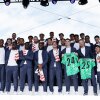 Players of the United States pose for a team photo on stage during the U.S. Soccer World Cup roster reveal on Tuesday in New York City.