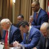 Housing and Urban Development Secretary Scott Turner prays during a Cabinet meeting with President Donald Trump at the White House in Washington on Feb. 26, 2025, as Secretary of State Marco Rubio and Defense Secretary Pete Hegseth and Commerce Secretary Howard Lutnick also bow their heads.