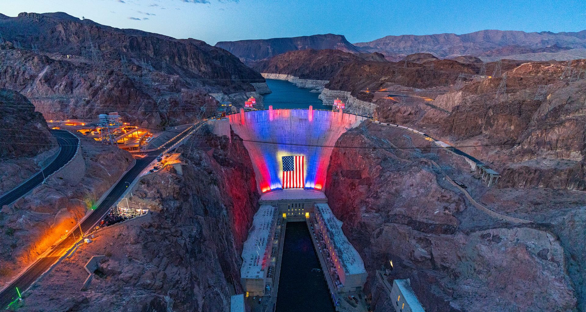 Huge flag draped over Hoover Dam as Lake Mead endures severe drought