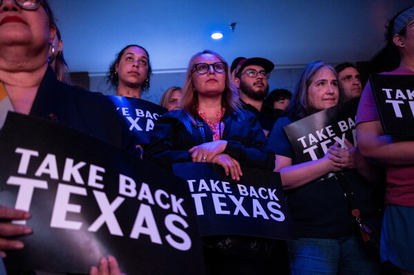 People a rally for Texas state Rep. and Democratic Senate candidate James Talarico in Houston, Wednesday, May 27, 2026. (AP Photo/Joel Angel Juarez)