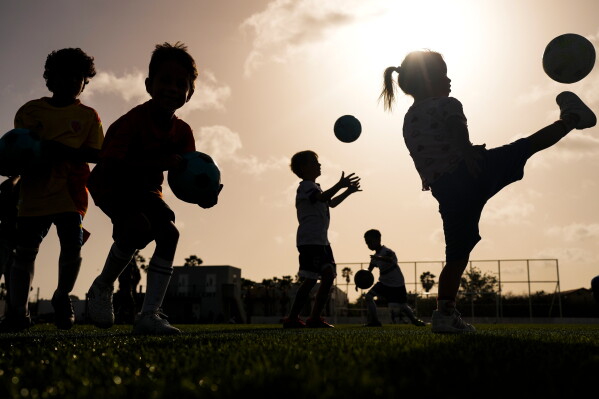 Children train at the C-Stars United soccer academy in Willemstad, Curacao, Friday, May 15, 2026. (AP Photo/Matias Delacroix)