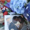 Items are displayed in the makeshift memorial for Charlie Kirk outside the headquarters of Turning Point USA on Sept. 18, 2025, in Phoenix, Arizona.