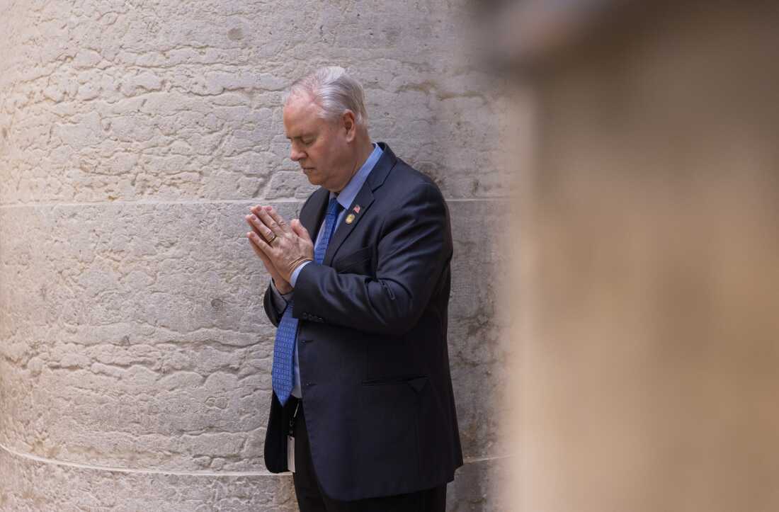 Ohio State Rep. Mark Johnson prays during “Prayer at the Statehouse”, a quarterly event hosted by the Center for Christian Virtue to pray with lawmakers in the middle of the state capitol in Columbus, Ohio in March.