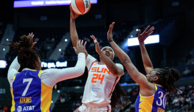 Aneesah Morrow (24) of the Connecticut Sun shoots against Ariel Atkins (7) and Nneka Ogwumike (30) of the Los Angeles Sparks during the first half of a WNBA basketball game at PeoplesBank Arena on May 30, 2026 in Hartford, Connecticut. 
