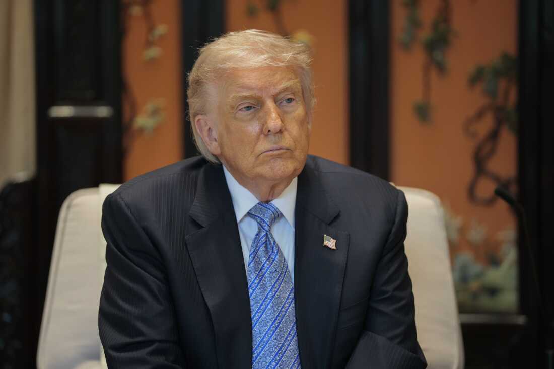 A federal judge is reviewing a $1.8 billion fund set up to pay people the president says were wronged by the federal government.