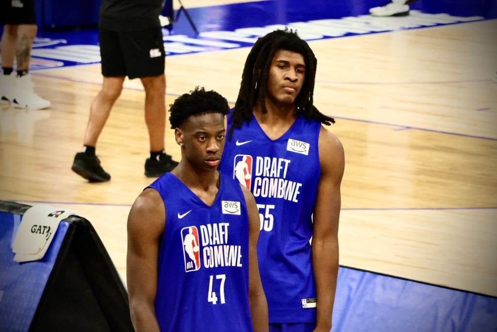 BYU forward AJ Dybantsa and Kentucky forward Jayden Quaintance wait for their turn in the shuttle run session. (Kevin Lu/MEDILL) 