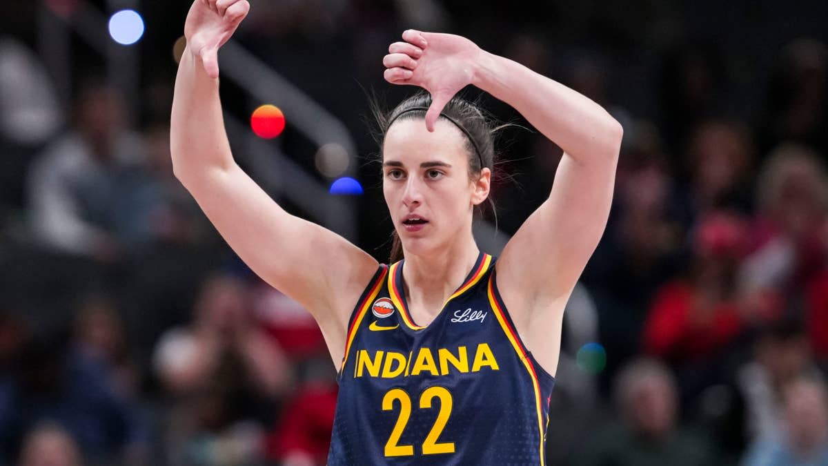 Indiana Fever guard Caitlin Clark gestures down the court Grace Smith/IndyStar / USA TODAY NETWORK via Imagn Images