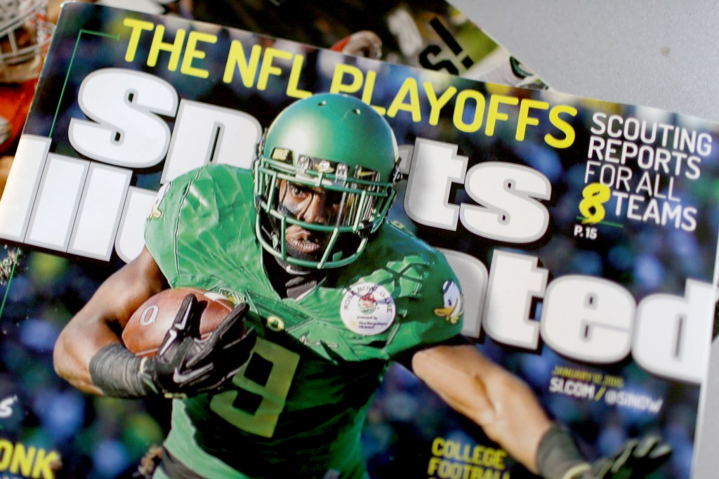 Photo illustration of Sports Illustrated magazine cover featuring a football player in a green uniform and helmet, with the words "THE NFL PLAYOFFS" and "SCOUTING REPORTS FOR ALL 8 TEAMS".